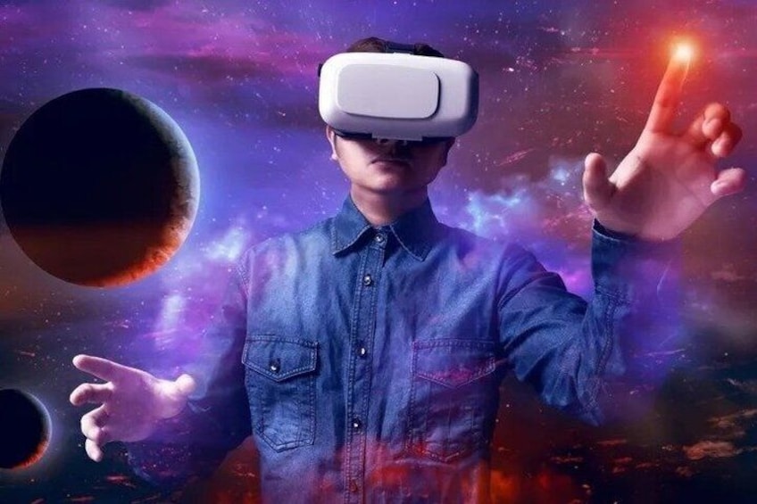 A person wearing a virtual reality headset in a space-themed environment with planets and a nebula. 4