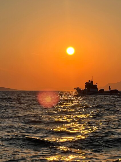 Picture 1 for Activity Makarska Sunset Boat Tour: Swim, Drone Pics, Quiz & Gifts! 3