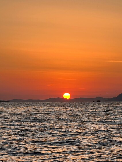 Picture 6 for Activity Makarska Sunset Boat Tour: Swim, Drone Pics, Quiz & Gifts! 4