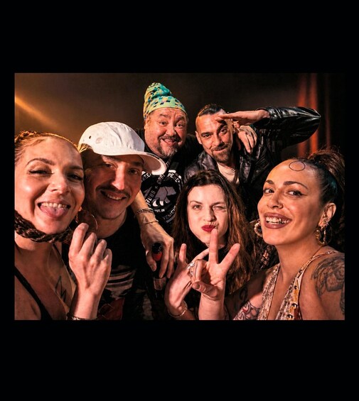 A group of people posing for a photo. 3