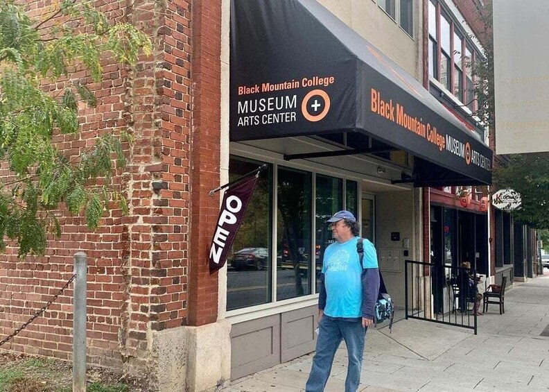 A brick building with a sign for Black Mountain College Museum Arts Center. 4