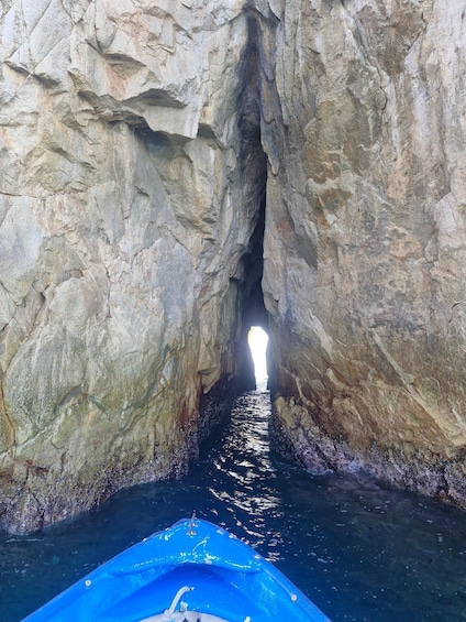 A narrow waterway between large rock formations. 2