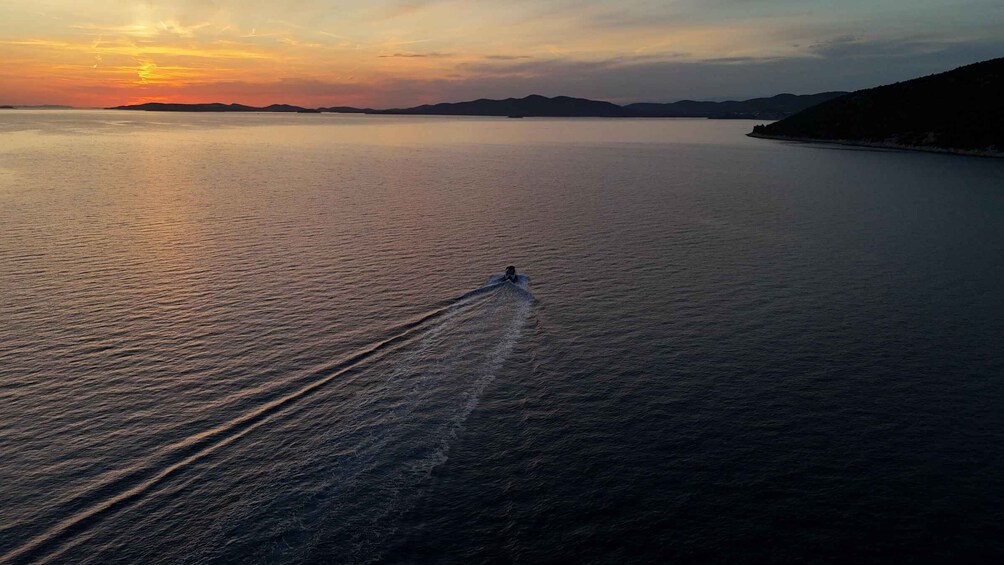 Picture 1 for Activity Vodice | Private Sunset Boat Cruise with Wine and Swim Stop 2