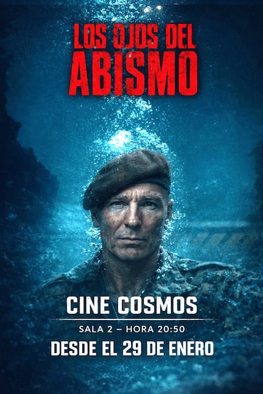 A movie poster with a man underwater, bubbles, and text indicating a cinema showing. 5