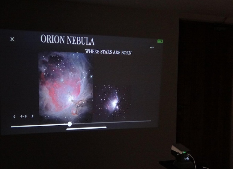A presentation screen with the Orion Nebula image and text 'ORION NEBULA WHERE STARS ARE BORN'. 1