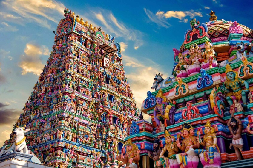A colorful temple with intricate carvings and statues. 1