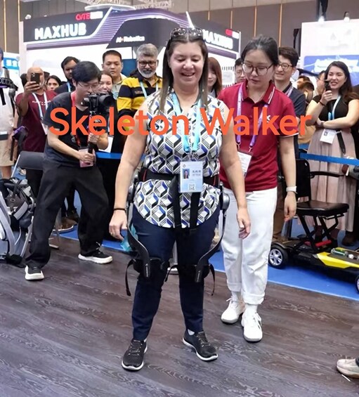 A person wearing a skeleton walker at a technology exhibition. 4