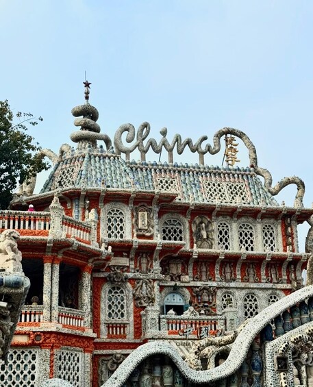 A building with intricate stonework and a sign that reads 'China.' 4