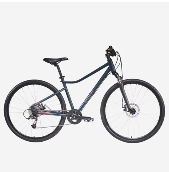 A blue mountain bike with a front suspension fork, a rear derailleur, and a chainring. 5