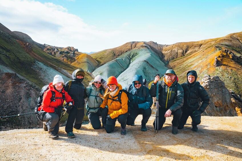 A group of hikers in a mountainous landscape. 1