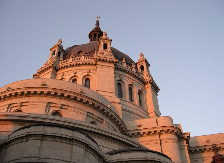 A large, ornate church with a prominent dome and twin towers. 3