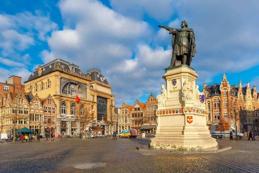 A historic square with a statue, ornate buildings, and cobblestone streets. 5