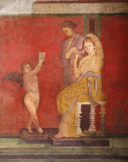 A fresco with a seated figure, a standing figure, and a winged child. 5