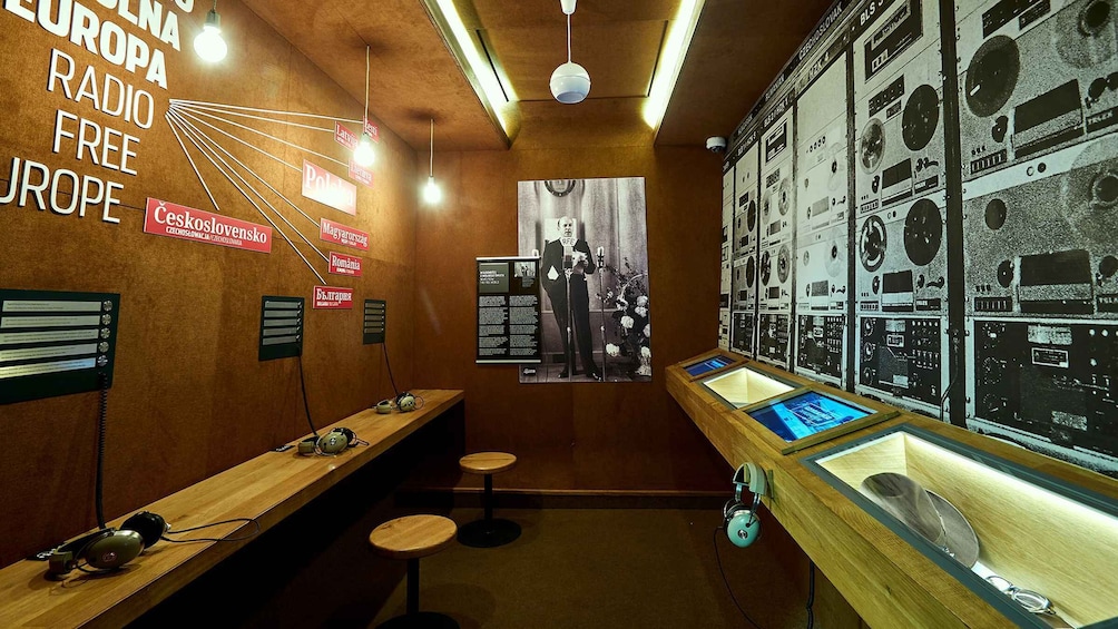 A radio museum with vintage equipment and a portrait of a man. 2