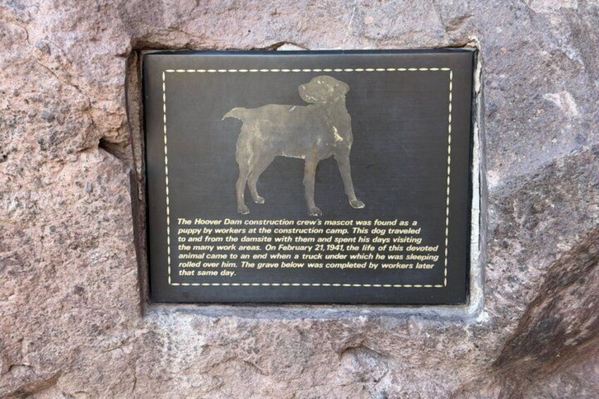 A memorial plaque with a silhouette of a dog and text about Hoover Dam construction crew's mascot. 5