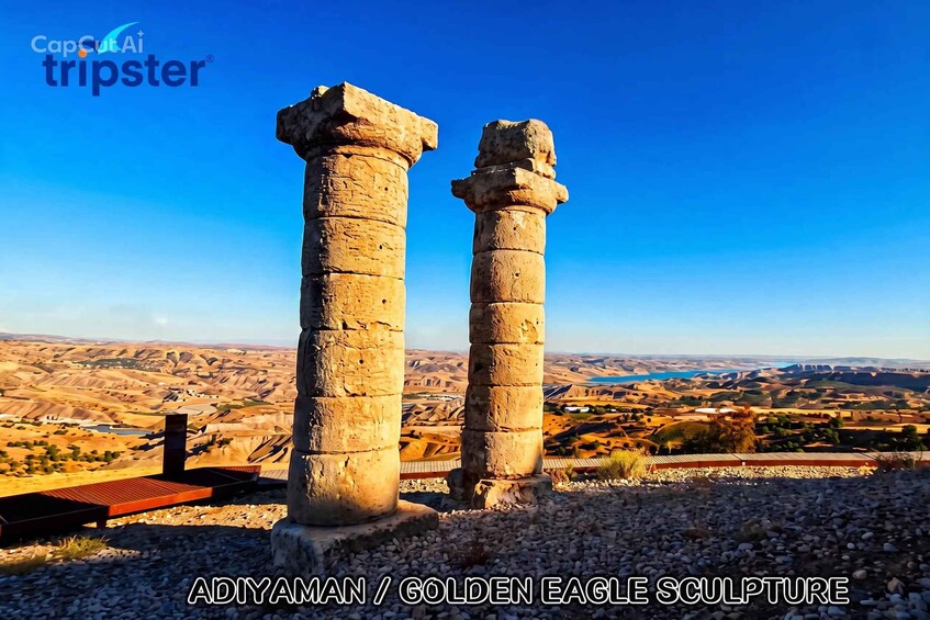 Ancient stone columns with a view of a desert landscape in the background. 2