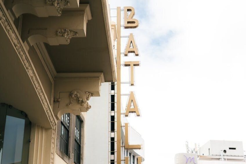 A building with the word 'BATA' on its facade. 1