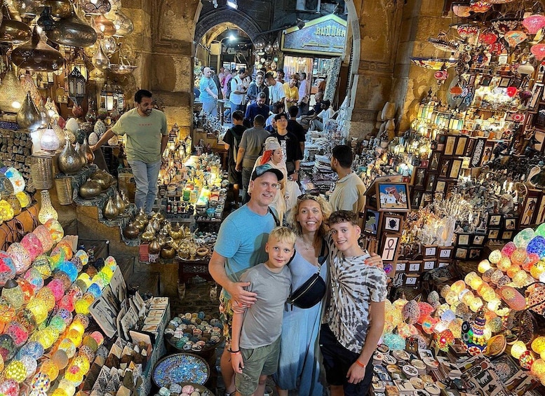 A bustling market with various stalls selling colorful pottery and decorative items. 5