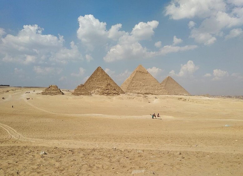 The Great Pyramids of Giza in a desert landscape. 1