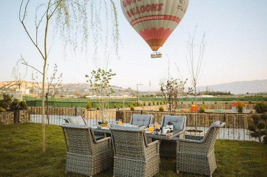 Wicker furniture, a hot air balloon, and a river. 2