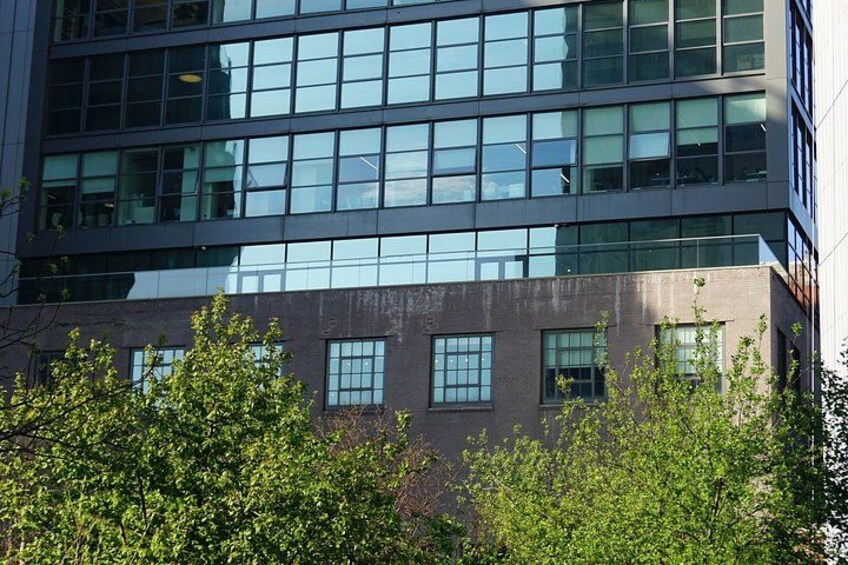A modern building with large windows and a brick facade. 3