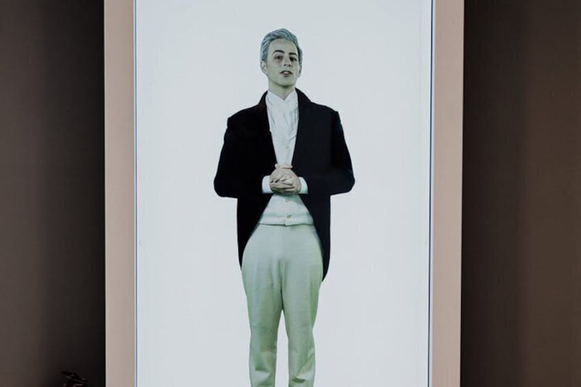 A person standing in front of a white background. 3