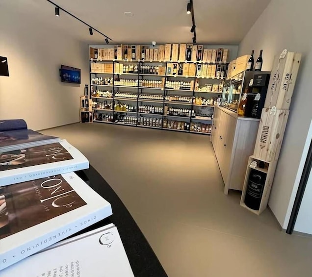 A bookstore with shelves of books and boxed items. 5