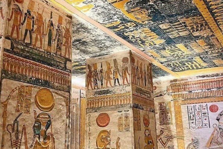 Ancient Egyptian wall paintings with hieroglyphs and figures. 2