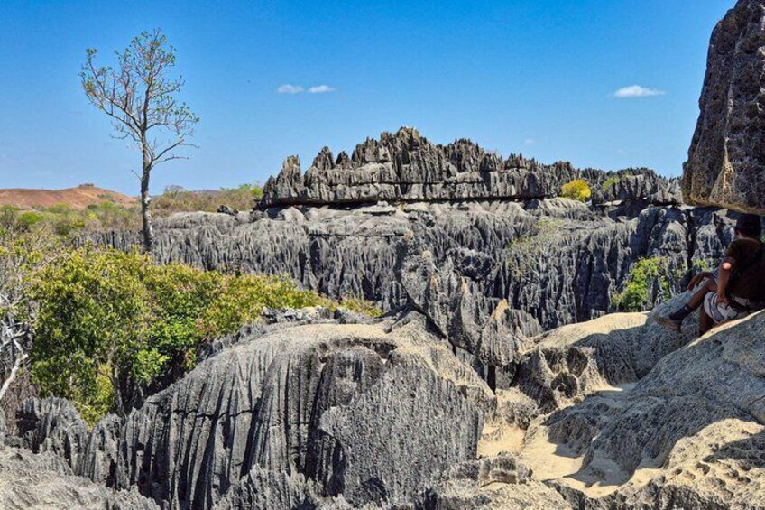 A rocky landscape with unique formations and a clear sky. 5