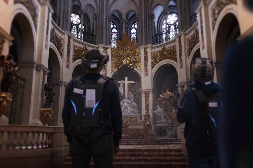 A grand cathedral interior with high arched ceilings, ornate statues, and a central altar. 4