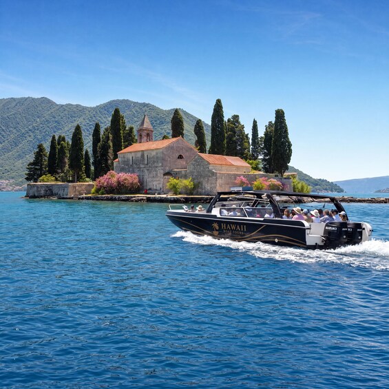 A boat named 'Hawaii Boat Tours' on a lake with a church and mountains in the background. 5