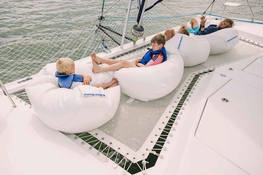 People on a boat with inflatable seating. 3