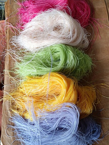 A collection of colorful yarns in various shades. 2