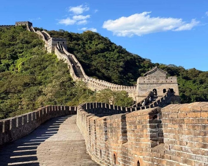 The Great Wall of China winding through a mountainous landscape. 2