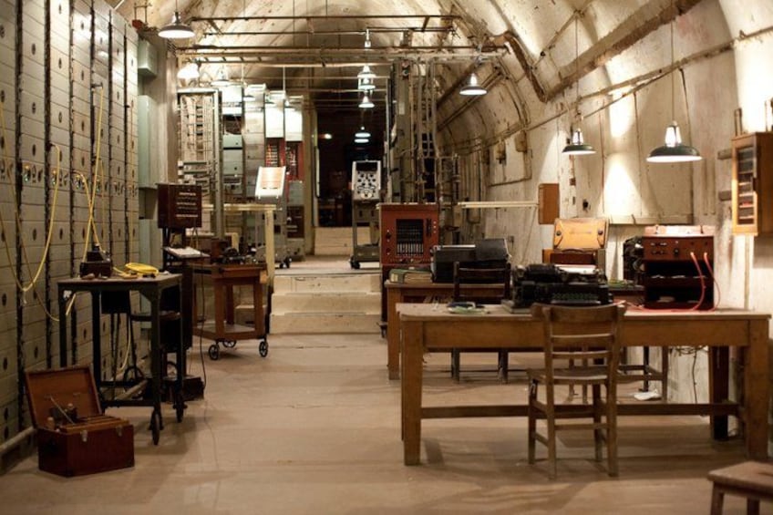 An industrial workshop with machinery, workbenches, and tools. 3