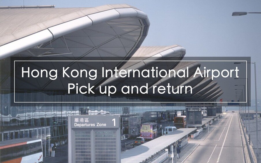 Hong Kong International Airport's departure zone with a modern terminal and a clear sky. 2