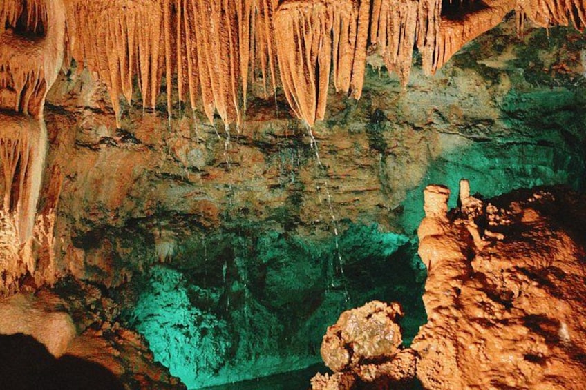A cave with stalactites and stalagmites. 1