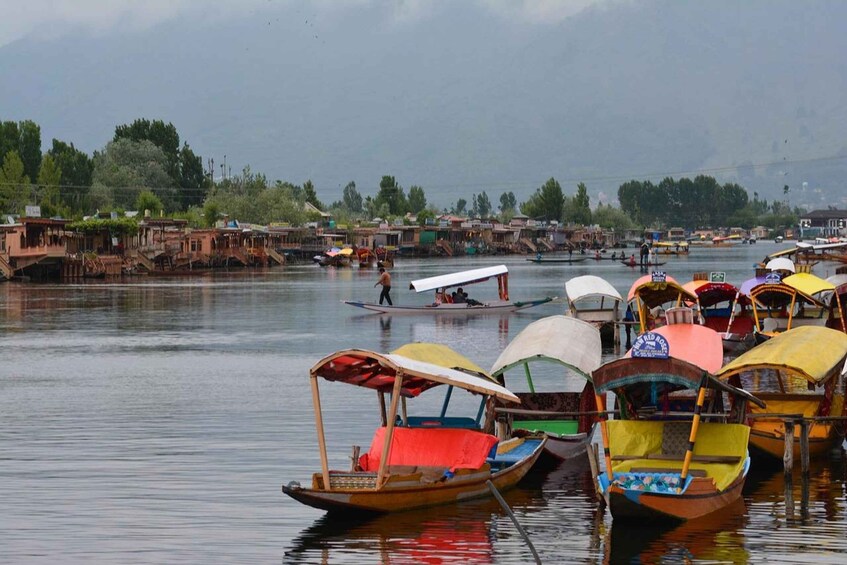 A river with boats and floating houses. 3