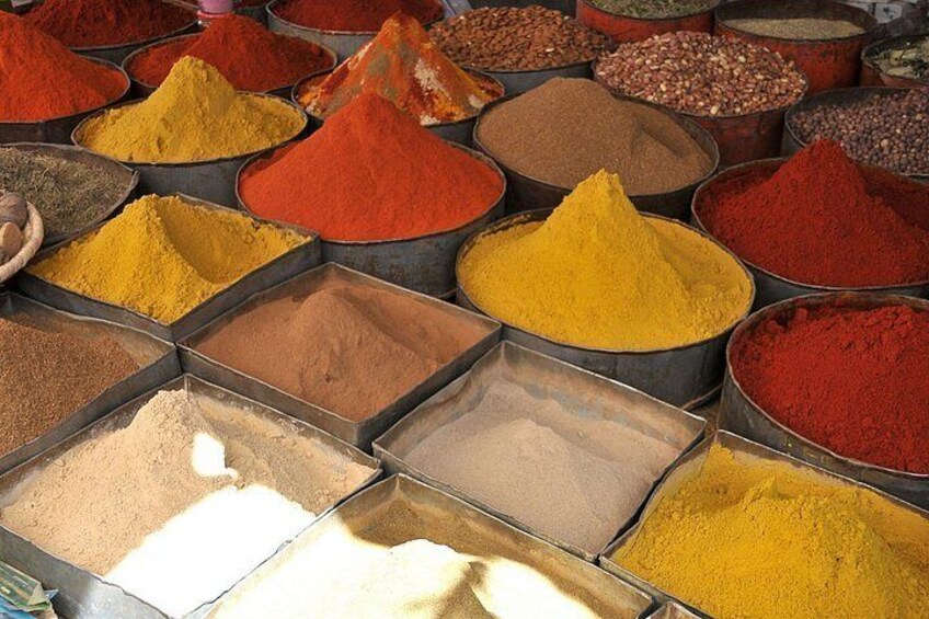 Various spices in metal containers. 5