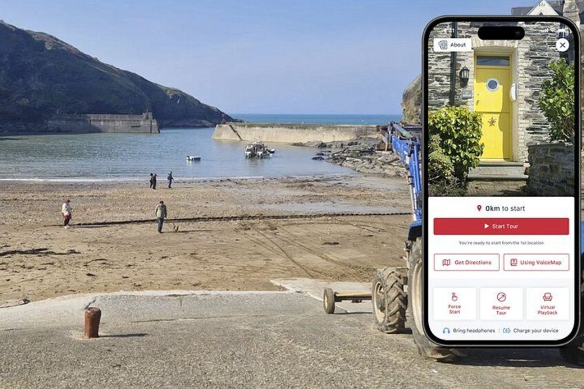 A smartphone displaying a tour app interface with a coastal scene in the background. 1