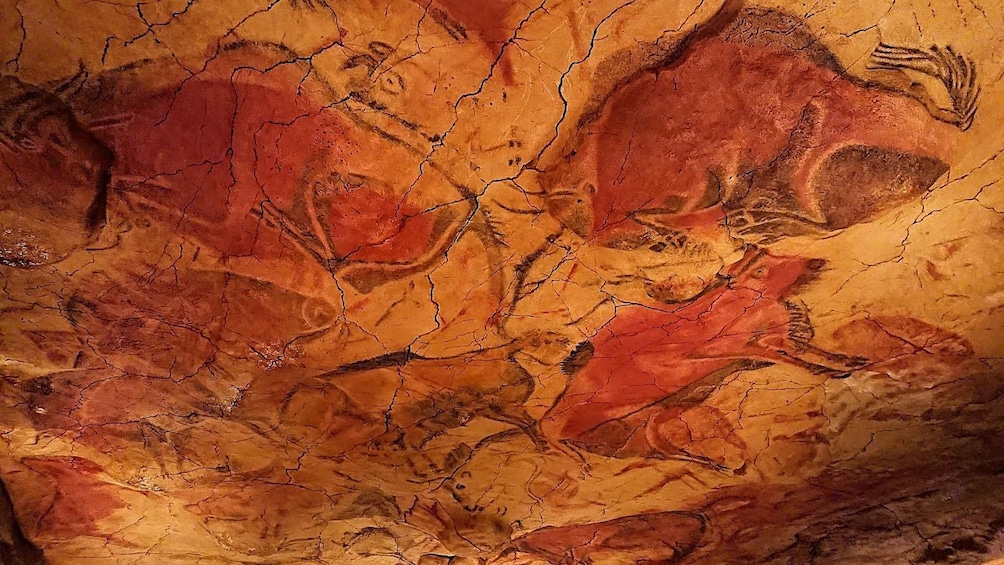 A textured surface with abstract patterns and shapes. 5
