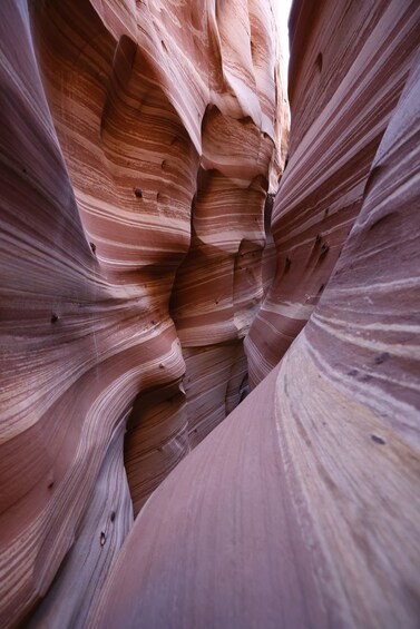 A close-up of a canyon with layered rock formations. 4