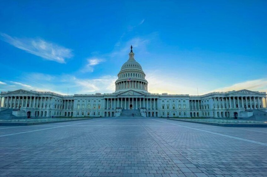 The United States Capitol building with a clear blue sky. 2