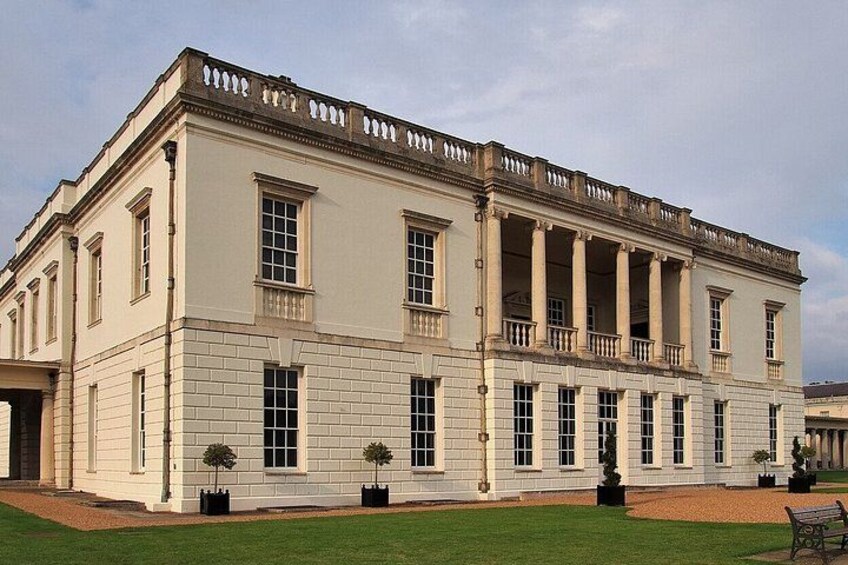 A large, classical building with columns and a symmetrical facade. 4