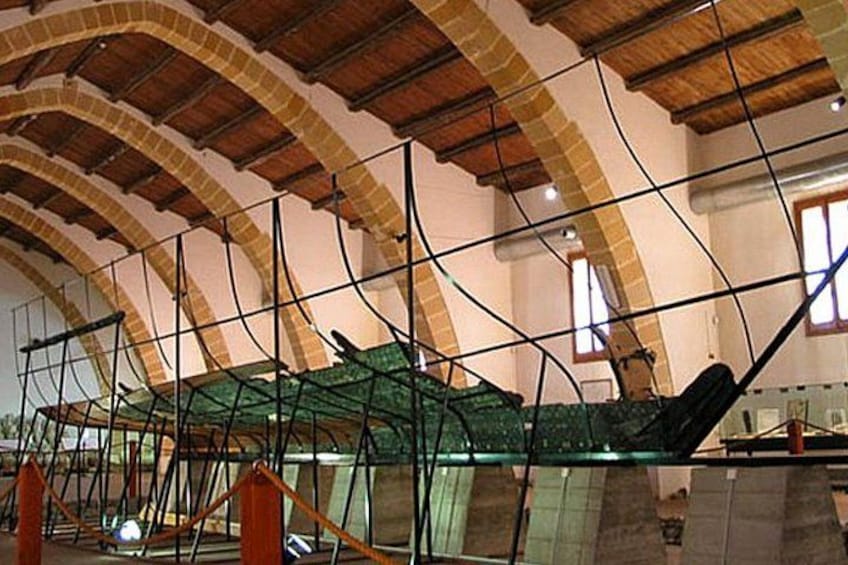 A construction site with scaffolding and a partially constructed roof. 2