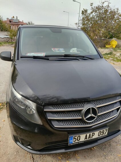 A black Mercedes-Benz with a Turkish license plate. 4