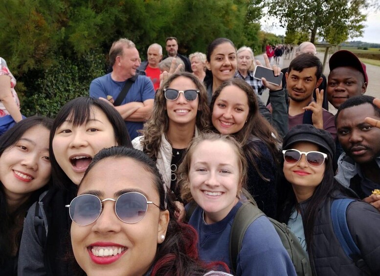 A group of people outdoors, likely on a hike or outdoor excursion. 4