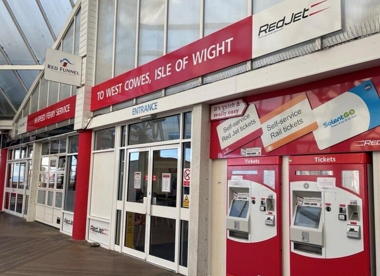 A Red Funnel ferry terminal with ticket machines and a Red Jet sign. 4