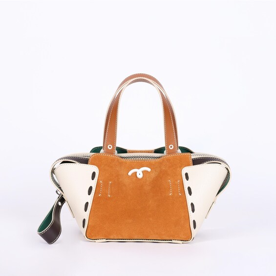 A brown and white handbag with a handle and a zipper. 4