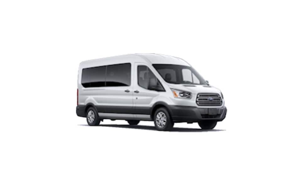 A white van with a front grille, side mirrors, and wheels. 1